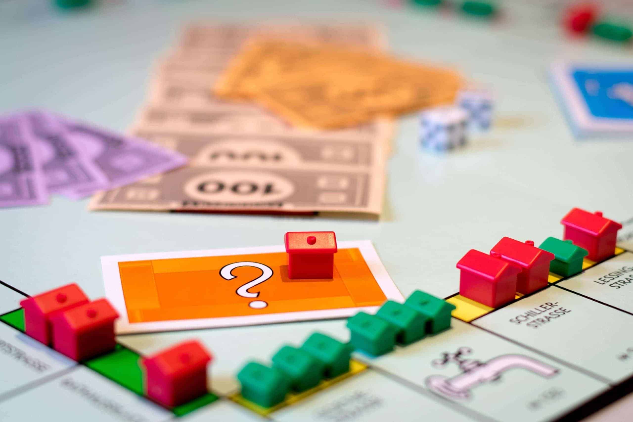 Monopoly board buying and selling auctions.